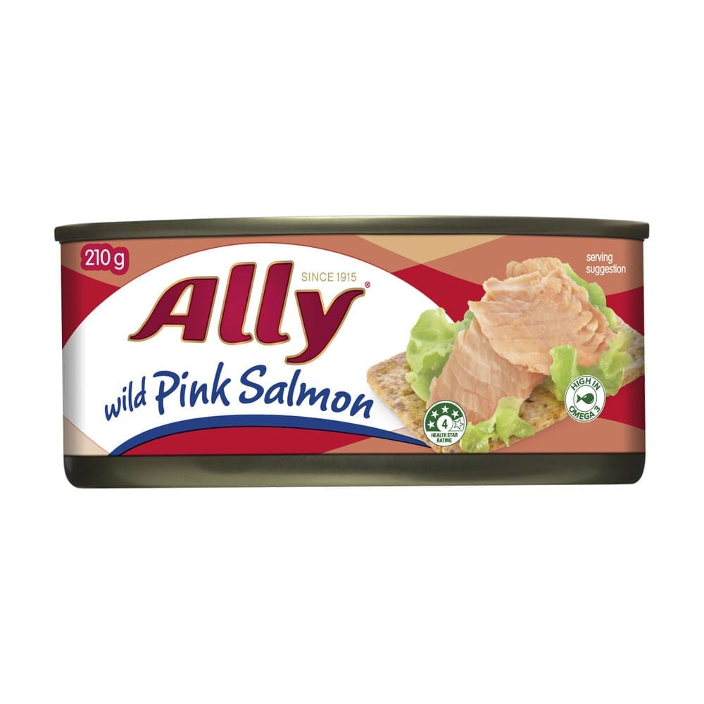 Can of 210g Ally wild pink salmon, high in omega, shown served on a cracker with lettuce.