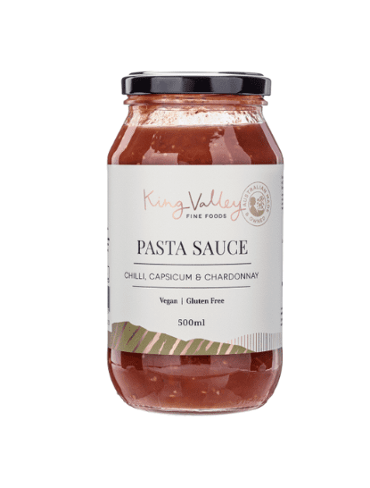 500ml jar of vegan, gluten-free pasta sauce with chili, capsicum, chardonnay, black lid.
