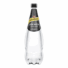 Schweppes soda water bottle with black and yellow label, filled with carbonated water.