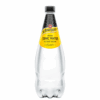 Clear plastic bottle of Schweppes Indian Tonic Water with yellow label and black cap.