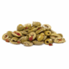 Bowl of sliced green olives with red pepper and herbs in oil dressing.
