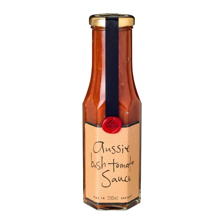 Bottle of Aussie Bush Tomato Sauce, 250ml, with handwritten label and red wax seal.