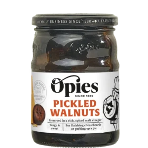 Jar of Opies Pickled Walnuts in spiced vinegar, ideal for cheeseboards, tangy and sweet.