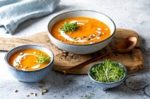 Vegetarian,Autumn,Pumpkin,And,Carrot,Soup,With,Cream,,Seeds,And