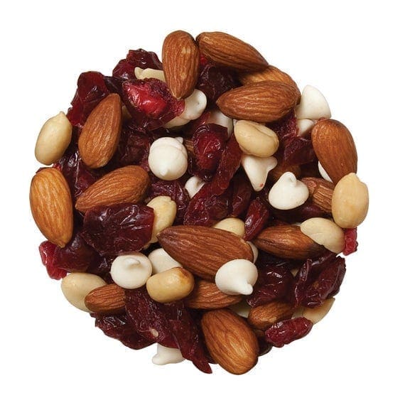 Mix of almonds, dried cranberries, white chocolate chips, and peanuts in circular arrangement.