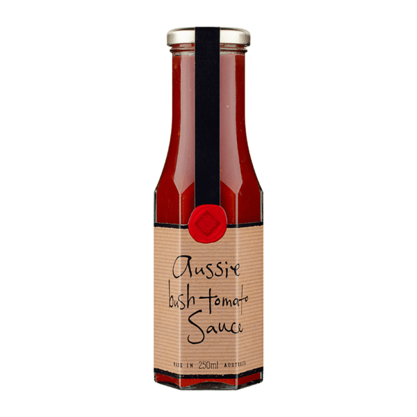 Glass bottle of Aussie Bush Tomato Sauce, 250ml, gold cap, red seal with black ribbon.