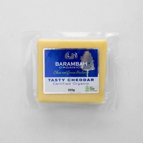 Barambah Organics 250g Tasty Cheddar, sealed, organic certification on blue and white label.