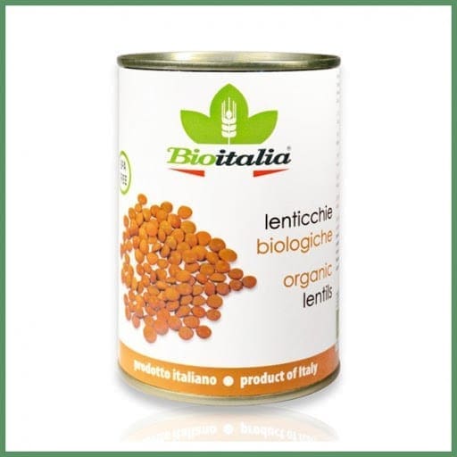 Can of Bioitalia organic lentils with lentil images and Italian product text on the label.