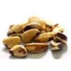 Pile of Brazil nuts with brown and cream shells on a white background.