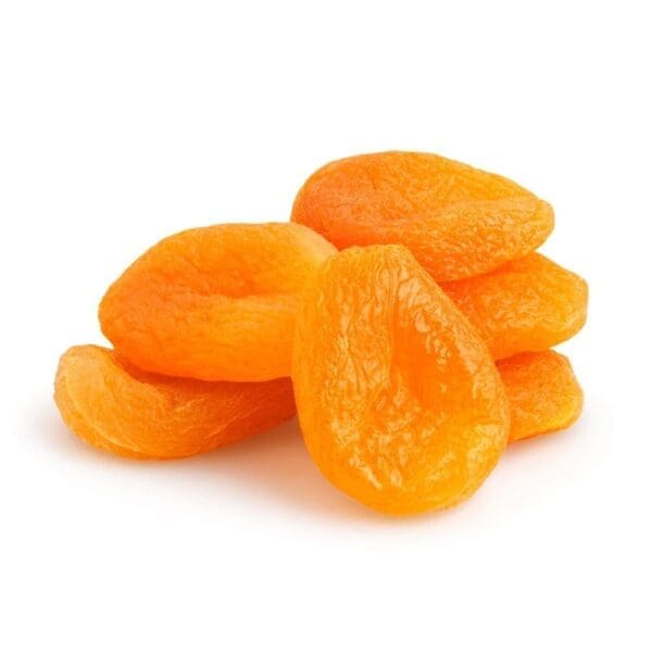 Small pile of bright orange dried apricots on a plain white background.