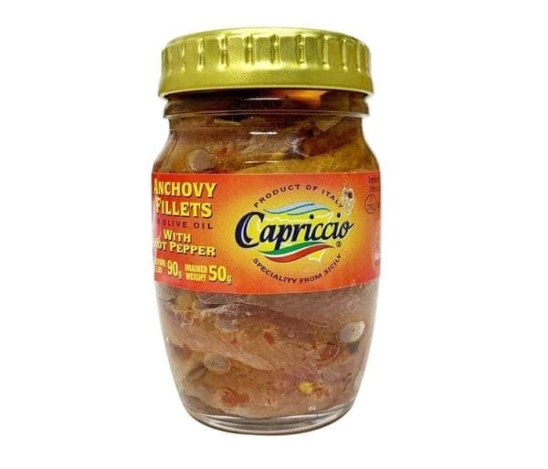 Jar of Capriccio anchovy fillets in olive oil with hot pepper, 90g, from Sicily, Italy.
