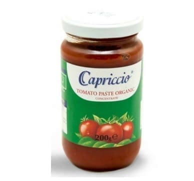 Glass jar of Capriccio Organic Tomato Paste, white lid, green label, 200 grams.