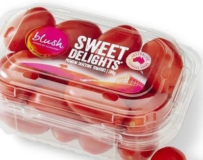 Clear plastic container of fresh cherry tomatoes labeled "Sweet Delights," 200 grams.