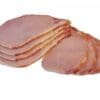 Slices of cooked ham arranged in a fanned-out pattern on a white surface.