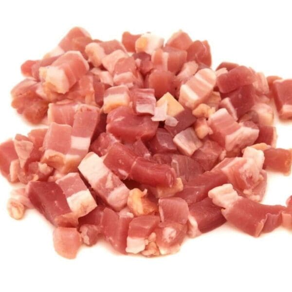 Small diced bacon pieces, uncooked, showing pink meat and white fat on a white background.