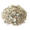 Pile of muted green, dried eucalyptus leaves and stems for herbal use.