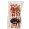Package of dry cured streaky bacon in clear plastic; marbled red and white slices visible.