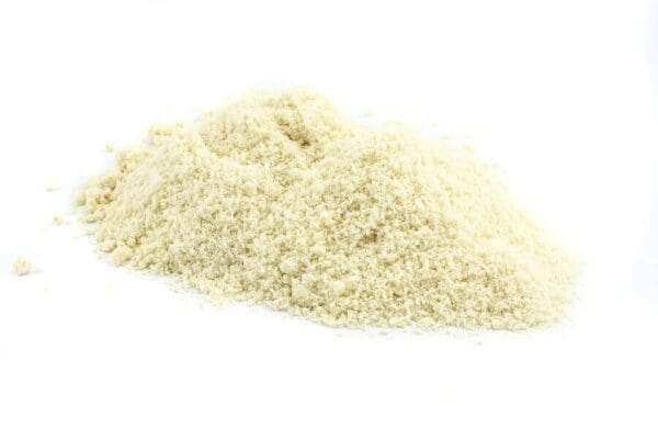 Pile of finely ground light-colored breadcrumbs on a plain white background.