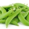 Fresh green snap peas piled, showcasing smooth pods and vibrant color.