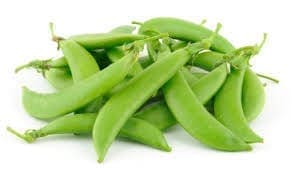 Fresh green snap peas piled, showcasing smooth pods and vibrant color.