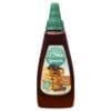 Bottle of Green's maple-flavored syrup, green cap, blueberry pancakes on label, 375g.