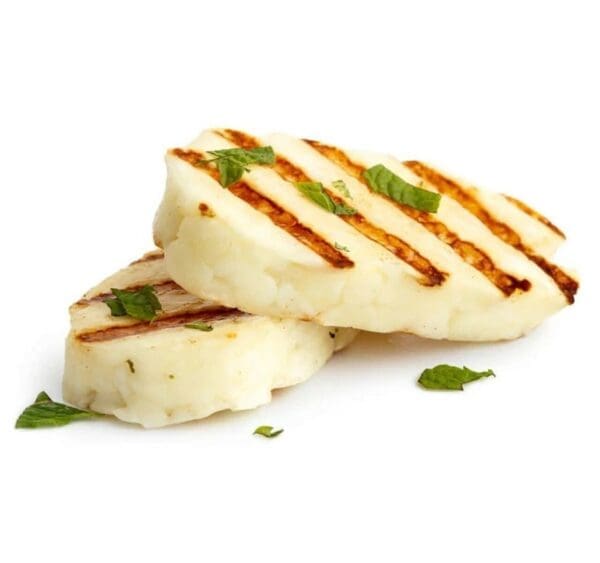 Grilled halloumi slices with herbs on white background.