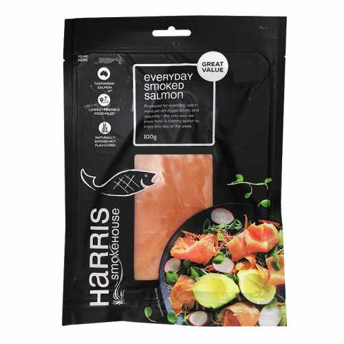Package of Harris Smokehouse 100g Tasmanian-sourced cold-smoked salmon with clear window.