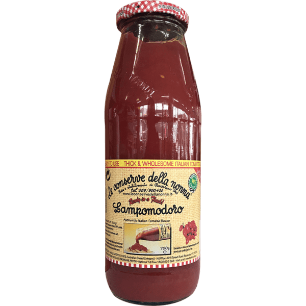 Glass bottle of Italian tomato sauce with checkered cap and decorative label.