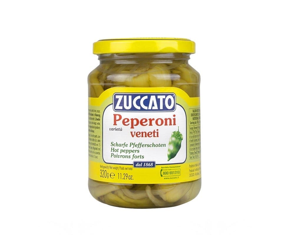 Jar of Zuccato Peperoni Veneti hot peppers with yellow lid, 320g, labeled in multiple languages.