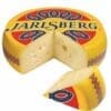 Jarlsberg cheese wheel with yellow-red wrapping and wedge cut, showing pale holes.