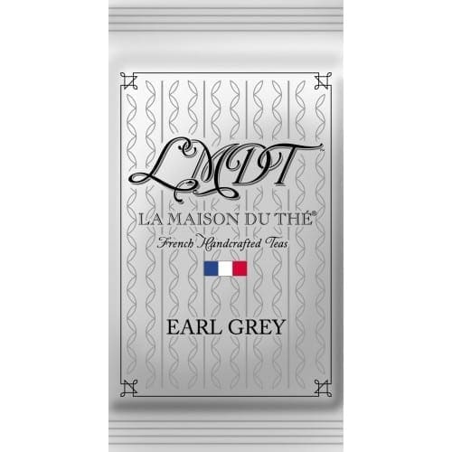 Package of "La Maison Du Thé" Earl Grey tea, grayscale design, French flag, intricate border.