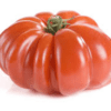 Large ripe tomato with deep ribs, vibrant red color, and small green stem on top.