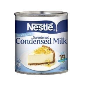 Nestlé sweetened condensed milk can with dessert image and nutritional info, 397g.