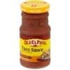 Jar of Old El Paso medium taco sauce, 200g, with yellow and red packaging, taco illustrations.