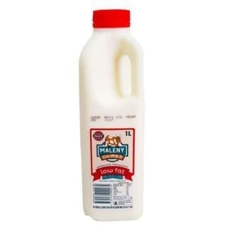 One-liter low-fat milk bottle with red cap, cow label, brand name, nutritional info.