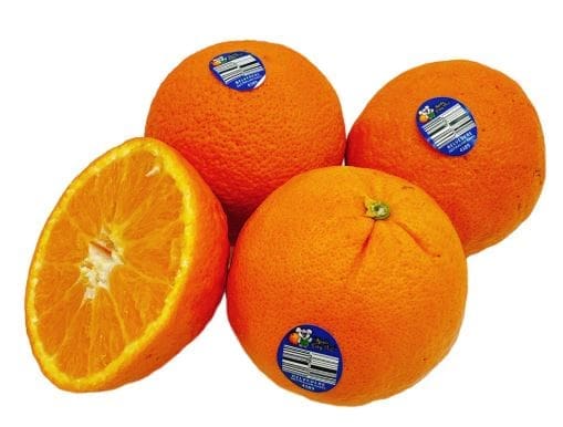 Four ripe oranges, one cut in half, with stickers showing labels and barcodes.