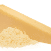 Wedge of pale yellow hard cheese with grated cheese on a white background.