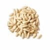 Pile of smooth, pale cream pine nuts on a white background.