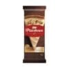 Plaistowe white chocolate package, dessert with nuts, brown background, award recognition.