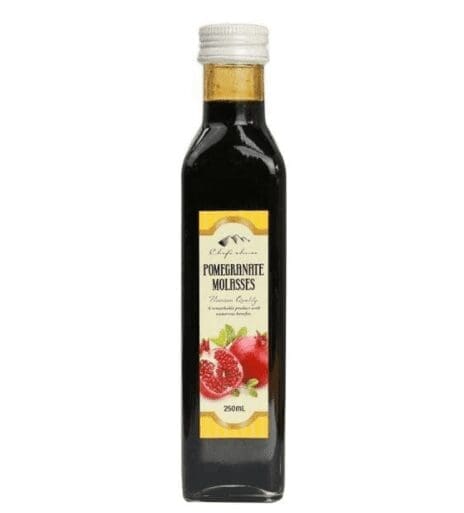 Bottle of 250ml pomegranate molasses with label and white cap.
