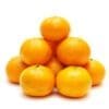 Pyramid of nine ripe oranges on a white background; bright color and smooth skins.