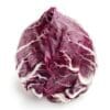Radicchio head with deep red-purple leaves and white veins on a white background.