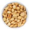 Bowl of shelled, roasted peanuts on a white background.