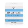 White and blue box of sea salt flakes, 100% pure, 250g, no additives or preservatives.
