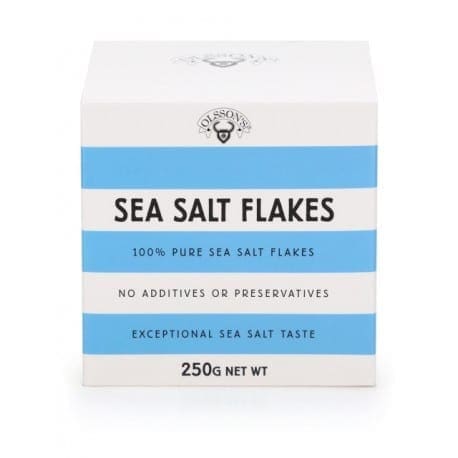 White and blue box of sea salt flakes, 100% pure, 250g, no additives or preservatives.