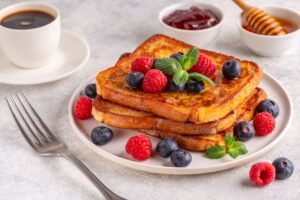 French,Toast,With,Blueberries,,Raspberries,,Maple,Syrup,,Morning,Breakfast.