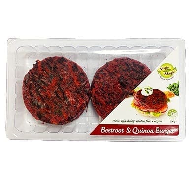 Plastic package with two vegan beetroot quinoa patties, gluten-free and moist, with label.