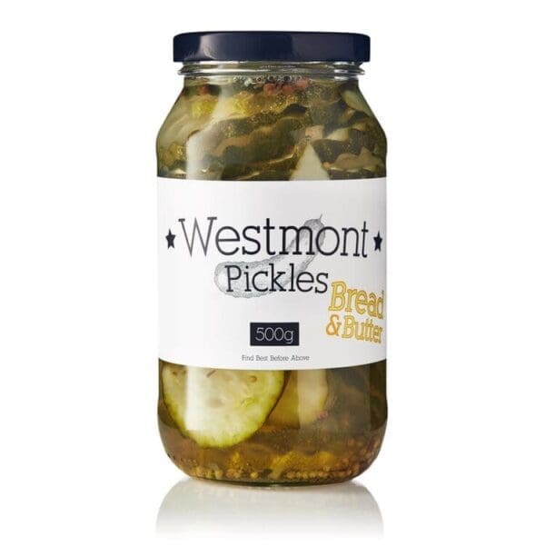Jar of "Westmont Pickles" bread & butter flavor, 500g, with sliced pickles in liquid.