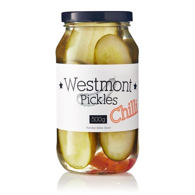 Jar of Westmont Chilli pickles, 500g, dark lid, containing sliced pickles in liquid.