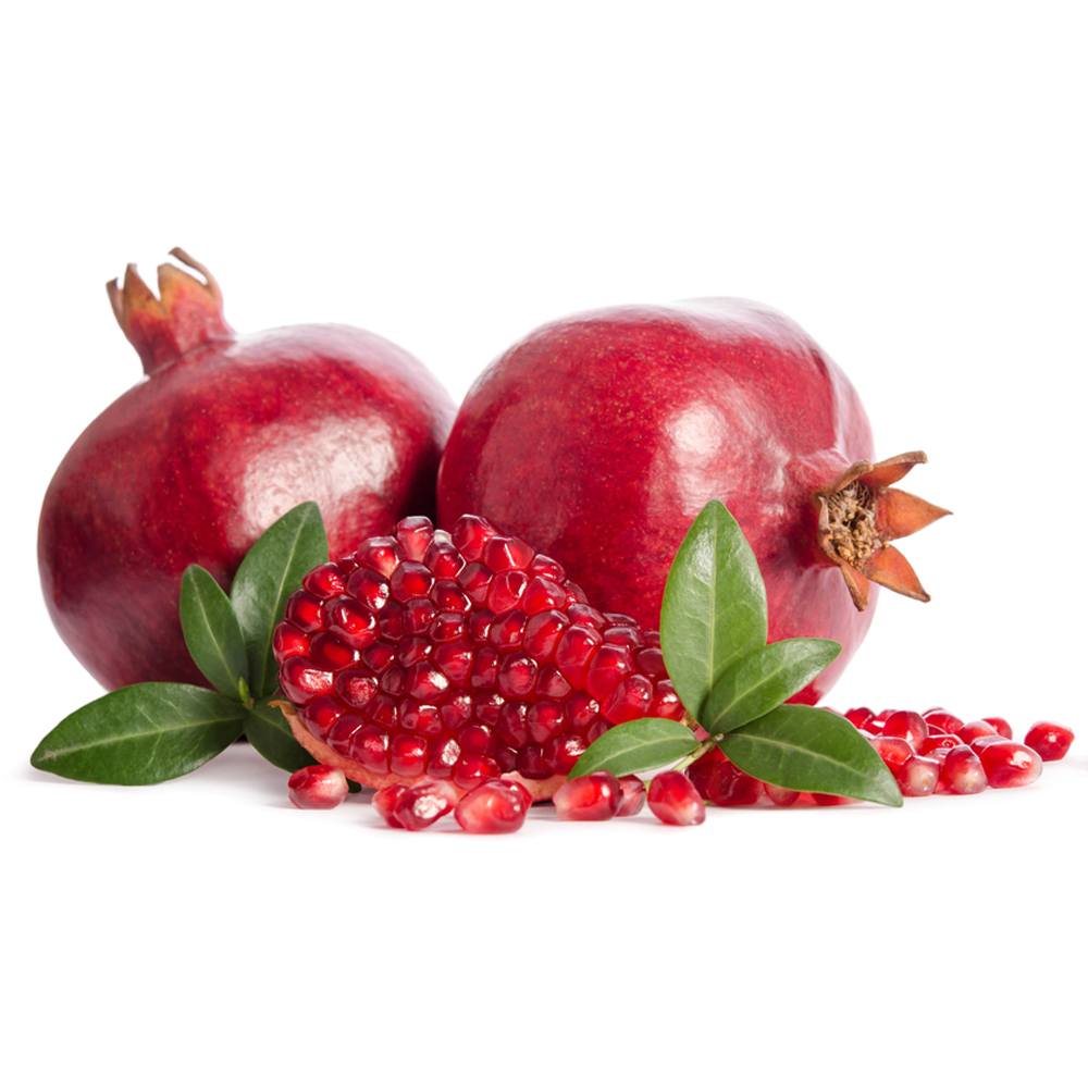 Two whole pomegranates and a cut section with seeds, placed on a white background with leaves.
